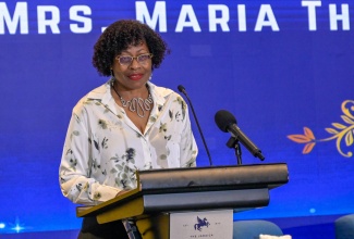 Executive Director of the Transformation Implementation Unit (TIU), Maria Thompson Walters, addressies the Government of Jamaica (GoJ) Service Excellence Conference 2026, held at the Jamaica Pegasus Hotel in New Kingston on Wednesday (May 13).
