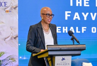 Minister of Finance and the Public Service, Hon. Fayval Williams, delivers remarks on behalf of Prime Minister, Dr. the Most. Hon. Andrew Holness, during the Government of Jamaica Service Excellence Conference 2026, held at The Jamaica Pegasus hotel in New Kingston, on Wednesday (May 13).
