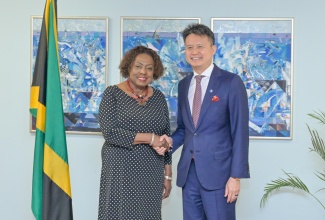 Minister of Culture, Gender, Entertainment and Sport, Hon. Olivia Grange, welcomes Director General of the World Intellectual Property Organization (WIPO), Daren Tang, ahead of a meeting held on Tuesday (May 19) at the Ministry