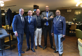 State Minister in the Ministry of Industry, Investment and Commerce, Hon. Delano Seiveright (second right), with (from left) Regional Manager for Jamaica Promotions Corporation (JAMPRO) Europe Office, Laurence Jones; Chairman and Chief Executive Officer of United Oil & Gas, Brian Larkin; Irish Investment Banker, Lorcan O’Murchu, and Jamaica’s Non-Resident Ambassador to Ireland and High Commissioner to the United Kingdom, His Excellency Alexander Williams, ahead of a business reception at the Iveagh Garden Hotel in Dublin, Ireland, on Monday, May 11.
