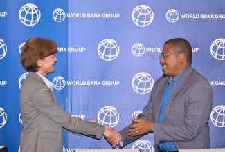 Minister of Agriculture, Fisheries, and Mining, Hon. Floyd Green, greets World Bank Division Director for the Caribbean, Lilia Burunciuc, during the launch of the AgriConnect Jamaica initiative, held on Wednesday (April 29) at World Bank Jamaica Office in New Kingston.
