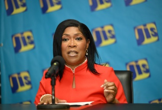 Chief Executive Officer and Registrar of the Companies Office of Jamaica, Shellie Leon, addresses a recent JIS 
