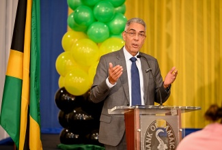 Bank of Jamaica (BOJ) Governor, Richard Byles, delivers the opening remarks during Friday