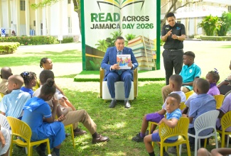 Prime Minister, Dr. the Most Hon. Andrew Holness, reads a book titled ‘I have Feelings’, by Cathryn O’Sullivan, to primary and infant-school students from Kingston and St. Andrew in celebration of Read Across Jamaica Day. The reading, held on Tuesday (May 5) at the Office of the Prime Minister, forms part of Education Week 2026 (May 3 to 9), under the theme ‘Literacy Resilience: Foundation of Nation-Building