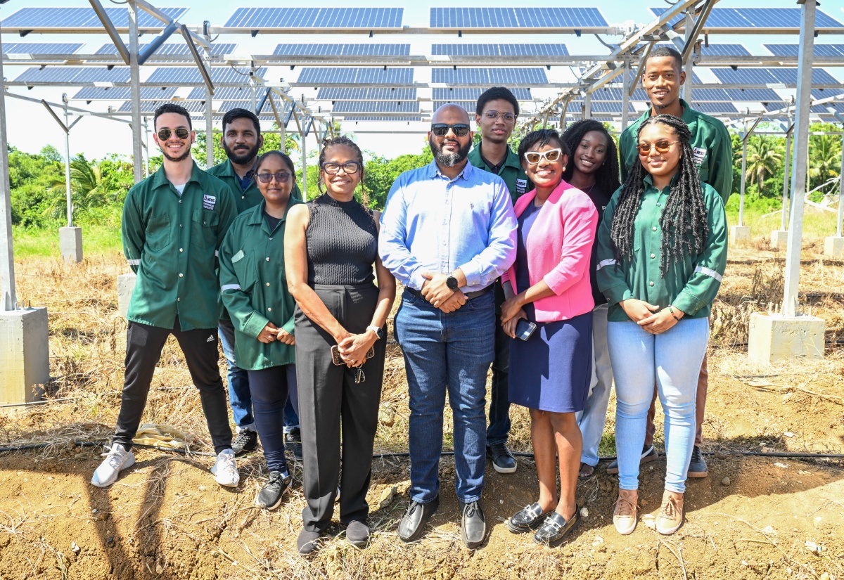 Representatives from the College of Agriculture, Science and Education (CASE) in Portland, and the National Energy Skills Center Technical Institute (NESC-TI) in Trinidad and Tobago, pause for a photo while touring CASE