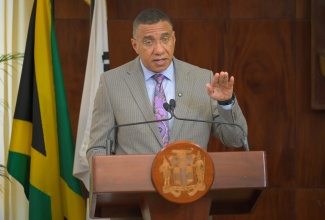 Prime Minister Dr. the Most Hon. Andrew Holness, delivers the main address during the Inception Ceremony for the Land Administration Capacity Enhancement Project (LACEP) at Jamaica House on Tuesday (May 12).
