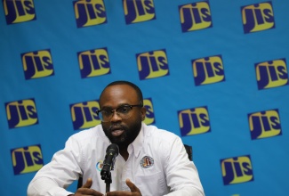 Director of Bauxite Lands and Programme Manager for the Bauxite Community Development Programme (BCDP),  Kemoy Lindsay, addresses a recent JIS Think Tank at the agency's Television Department, 5-9 South Odeon Avenue in Kingston.
