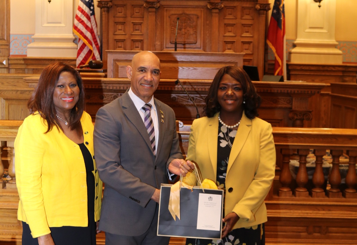 Jamaica’s Ambassador to the United States, His Excellency Major General (Ret’d) Antony Anderson, receives a Georgia State Senate resolution from State Senator, Tonya Anderson, during a ceremony at the State Capitol on May 4. At left is Jamaica’s Honorary Consul in Atlanta, Dr. Elaine Grant Bryan.
