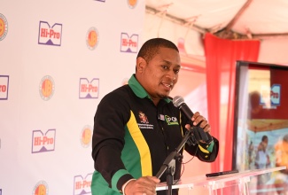 Minister of Agriculture, Fisheries and Mining, Hon. Floyd Green, addresses the Comeback Coops initiative in the Parottee community in St. Elizabeth on Friday, May 1.
