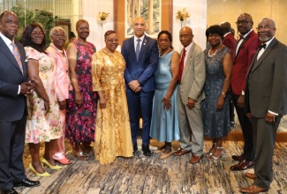 Jamaica’s Ambassador to the United States, His Excellency Major General (Ret’d) Antony Anderson (centre), shares a light moment with members of the Board of The Mico Old Students’ Association New York Chapter during the Gala celebrating the organisation’s 51st anniversary, held recently at the Glen Terrace in Brooklyn, New York.
