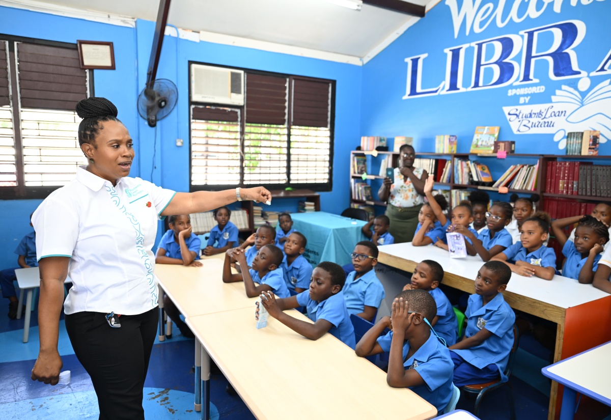 SLB Staff Read to Students At Port Royal Primary