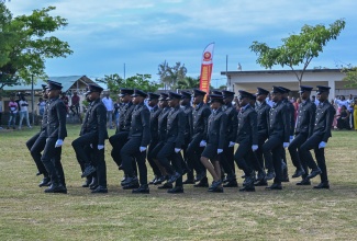 The Elite Squad of Intake 27 of the Jamaica Fire Brigade lead a drill display during their graduation ceremony on May 9, at Iona High School in St. Mary.
