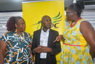 Chair of the Jamica Cultural Development Commission (JCDC) St. Catherine Festival Queen Committee, Ayodale Taylor McDonald (right), converses with JCDC St. Catherine Parish Manager, Vanessa Patterson, and Eastern Regional Manager, David Reid, during the 2026 Miss St. Catherine Festival Queen Sashing Ceremony. The event, held recently at Perry’s Lounge in Spanish Town, St. Catherine, is a key feature of the competition, where parish contestants are formally introduced to the public and awarded sashes from their respective sponsors, whom they represent throughout the contest.