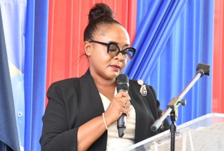Parish Court Judge Kaysha Grant Pryce addresses the graduation ceremony for the 91st Cohort of the Staff and Junior Command Course at the National Police College of Jamaica (NPCJ) in Twickenham Park, St. Catherine on Friday (May 22).