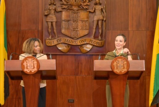 Minister of Foreign Affairs and Foreign Trade, Senator the Hon. Kamina Johnson Smith (right), is joined by Minister of Education, Skills, Youth and Information, Senator, Dr. the Hon. Dana Morris Dixon, as she responds to question during a Post-Cabinet Press Briefing held at Jamaica House on Wednesday (June 3).
