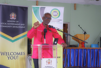 Minister of Local Government and Community Development, Hon. Desmond McKenzie, addresses the Community Churches Clean Up and Restoration Grant Programme handover ceremony for churches affected by Hurricane Melissa, held at Darliston Holiness Church in Westmoreland on June 25.