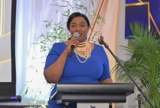 Minister of State in the Ministry of Culture, Gender, Entertainment and Sport, Hon. Kerensia Morrison addresses the audience during the Outstanding Fathers Award Ceremony at the Jamaica Pegasus Hotel in New Kingston on Friday (June 19). The event was held under the theme ‘Built on Strength and Sacrifice: Honouring Resilience and Commitment’.