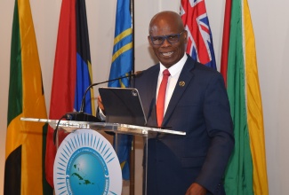 Custos of Kingston, Hon. Steadman Fuller, delivers address of Governor-General, His Excellency the Most Hon. Sir Patrick Allen, at the opening of the 12th Annual Commonwealth Caribbean Association of Integrity Commissions and Anti-Corruption Bodies (CCAICAB) Conference, on June 1, at the ROK Hotel, in Kingston.