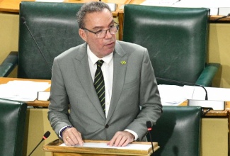 Minister of Energy, Transport and Telecommunications, Hon. Daryl Vaz, presents a statement to Parliament on Wednesday (June 10).
