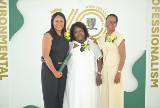 The newest Shortwood Teachers’ College Alumni Association Honour Roll inductees share a photo opportunity during Saturday’s (June 27) 100th anniversary luncheon, held at Marjorie Myers Hall on the College's St. Andrew campus. From left are Acting Director of Corporate Communications and Public Relations in the Ministry of Education, Skills, Youth and Information, Sheryl Bromfield, who represented honouree,  Cabinet Secretary, Audrey Sewell; Educator, Author and Life Coach, Judith Thompson-Hall; and Director of the School of Education at the University of the West Indies (UWI), Mona, Professor Carmel Roofe.