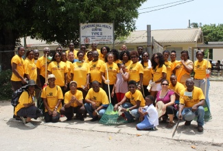Participants in a previous Jamaica Diaspora Day of Service pose for a photograph following the execution of a project at the Catherine Hall Health Centre in St. James. The Day of Service returns on June 18 as part of the 11th Biennial Jamaica Diaspora Conference.