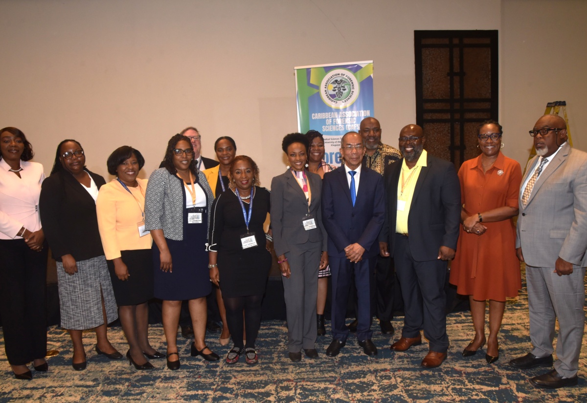 Minister of National Security and Peace, Hon. Dr. Horace Chang (fourth right), shares a photo opportunity with delegates from Jamaica and other Caribbean territories at the Caribbean Association of Forensic Sciences Biennial Conference on Monday (June 8), at The Jamaica Pegasus hotel in New Kingston. 
