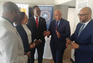 Director-General of the Major Organised Crime and Anti-Corruption Agency (MOCA), Colonel Desmond Edwards (second right), makes a point during a discussion at the opening of the 12th Annual Commonwealth Caribbean Association of Integrity Commissions and Anti-Corruption Bodies (CCAICAB) Conference on June 1, at the ROK Hotel in Kingston. Others pictured (from left) are Acting Senior Director at the Commonwealth Secretariat, Dr. Roger Kornteng; Chairperson of the CCAICAB, Lady A. Anande Trotman Joseph; Chief Technical Director, Revenue Protection Division, Cranston Morgan, and Executive Director of the Integrity Commission, Craig Beresford.