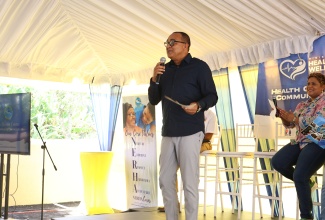 Minister of Health and Wellness, Dr. the Hon. Christopher Tufton, addresses the official handover ceremony for the newly rehabilitated Bamboo Community Health Centre in St. Ann on Friday, June 5. At right is Minister of State in the Ministry of Health and Wellness, Hon. Krystal Lee.
