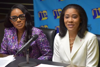 Director, Sales Service and Channel Delivery, Scotia Jamaica Life Insurance Company Ltd., Kerry Ann Chong (right), and Senior Corporate Investment Manager, Scotia Investments Jamaica Ltd., Tameka Peru-Thomson, Scotia Investments Jamaica Ltd. address a JIS Think Tank on Wednesday, June 3, at the agency's office in Kingston.
