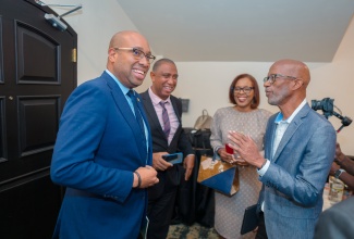 Minister of State in the Ministry of Industry, Investment and Commerce, Hon. Delano Seiveright (left), with (from second left), General Manager of the Spirits Pool Association Limited (SPA), Christopher Gentles; Permanent Secretary in the Ministry of Foreign Affairs and Foreign Trade, Ambassador Sheila Sealy Monteith; and Chairman of the West Indies Rum and Spirits Producers' Association (WIRSPA) and the Spirits Pool Association Limited, Clement 