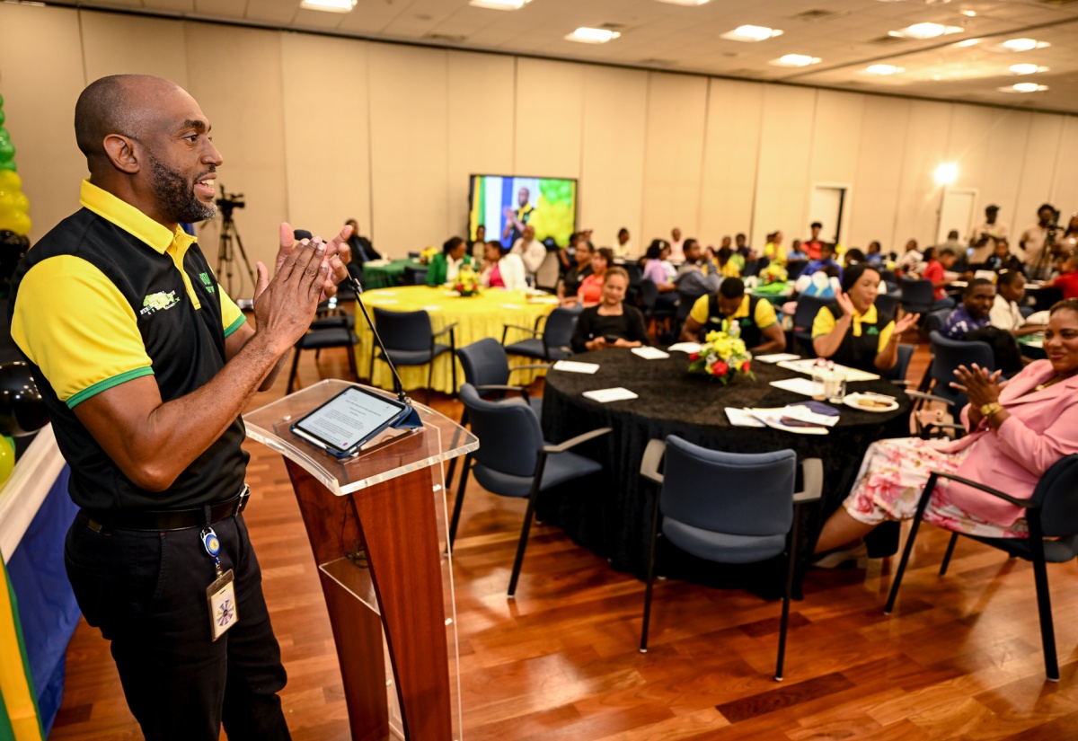 Senior Deputy Governor at the Bank of Jamaica (BOJ), Dr. Wayne Robinson (left), addresses the launch of the financial literacy gamification platform, Money Quest, at the BOJ Auditorium in Kingston on Friday (May 29).

 