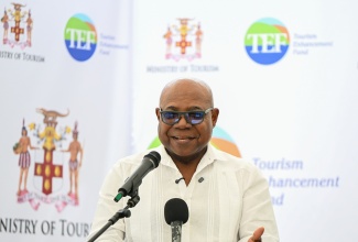 Minister of Tourism, Hon. Edmund Bartlett, delivers the feature address at a ceremony held in Geddes Town Square, St. Mary, on May 29, marking the symbolic opening of the rehabilitated Fontabelle to Geddes Town Road. The project is expected to enhance access to key heritage and ecotourism attractions in the parish, while supporting community development and economic growth. 
