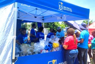 Westmoreland residents flock to the Universal Service Fund (USF) booth during the agency