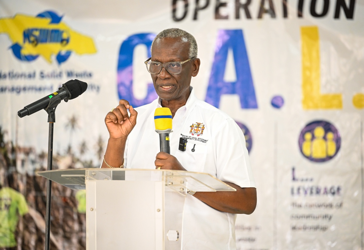 Minister of Local Government and Community Development, Hon. Desmond McKenzie, addresses the launch of Operation CALM (Cleaning, Advising, Leveraging and Maintaining) in Rocky Point, Clarendon, on Tuesday (June 2).