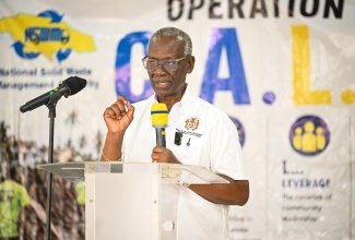 Minister of Local Government and Community Development, Hon. Desmond McKenzie, addresses the launch of Operation CALM (Cleaning, Advising, Leveraging and Maintaining) in Rocky Point, Clarendon, on Tuesday (June 2).