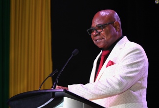 Minister of Tourism, Hon. Edmund Bartlett, gives remarks during the 25th Anniversary Celebration of RIU Jamaica held at RIU Montego Bay in St. James on Thursday ( June 18). 