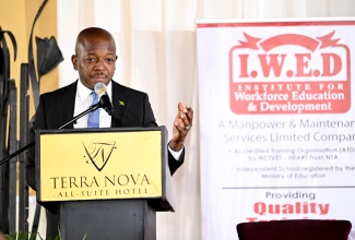 Minister of Labour and Social Security, Hon. Pearnel Charles Jr., addresses a corporate consultation hosted by the Institute for Workforce Education and Development (IWED) on Wednesday (July 1) at the Terra Nova All-Suite Hotel in Kingston.
