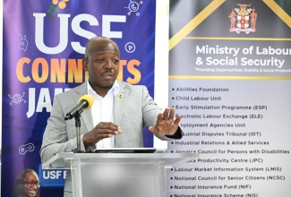 Minister of Labour and Social Security, Hon. Pearnel Charles Jr., delivers remarks during the Information and Communications Technology (ICT) handover ceremony at the Jamaica Council for Persons with Disabilities (JCPD) head office in Kingston on Wednesday (July 15).

