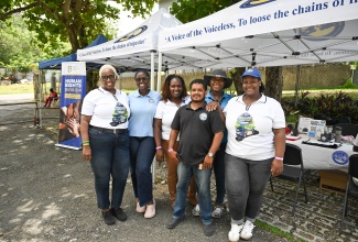 Members of the Office of the Public Defender team that assisted residents during the Boston Bay leg of the Redress Road Tour in Portland on July 1.
