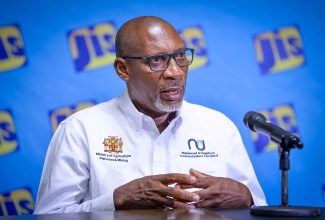 Director of Engineering and Technical Services at the National Irrigation Commission Limited (NIC), Rohan Stewart, addresses a Jamaica Information Service (JIS) Think Tank at the agency