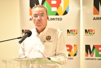 Minister of Energy, Transport and Telecommunications, Hon. Daryl Vaz. 

