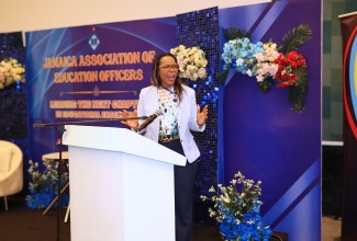 Permanent Secretary in the Education, Skills, Youth and Information Ministry, Dr. Kasan Troupe, addresses the Jamaica Association of Education Officers Annual General Meeting on Thursday, August 20 at the Iberostar Resort in Lilliput, St. James. 
