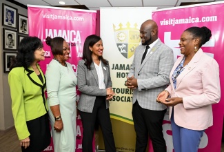 Jamaica Product Exchange (JAPEX) Chair, Nicola Madden-Greig (centre), engages in discussion with Jamaica Hotel and Tourist Association (JHTA) President, O’Brian Heron, and other tourism stakeholders during the launch of JAPEX 2026 on Monday (August 10) at the Jamaica Tourist Board (JTB) headquarters in New Kingston. Also participating in the conversation are (from left) JHTA Executive Director, Camille Needham; JHTA Ocho Rios Chapter Chair, Vana Taylor; and Permanent Secretary in the Ministry of Tourism, Jennifer Griffith.
