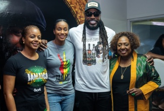 Minister of Culture, Gender, Entertainment and Sport, Hon. Olivia Grange (right), is pictured with (from left): Member of Parliament for St James West Central, Marlene Malahoo Forte; State Minister in the Ministry of Education, Skills, Youth and Information, Hon. Rhoda Moy Crawford and Cricket Legend, Christopher 