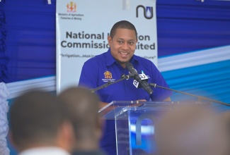 Minister of Agriculture, Fisheries and Mining, Hon. Floyd Green, delivers the keynote address during the commissioning ceremony for the $37.8-million Solar Photovoltaic Pump Station in Duff House, Manchester, on August 20.
