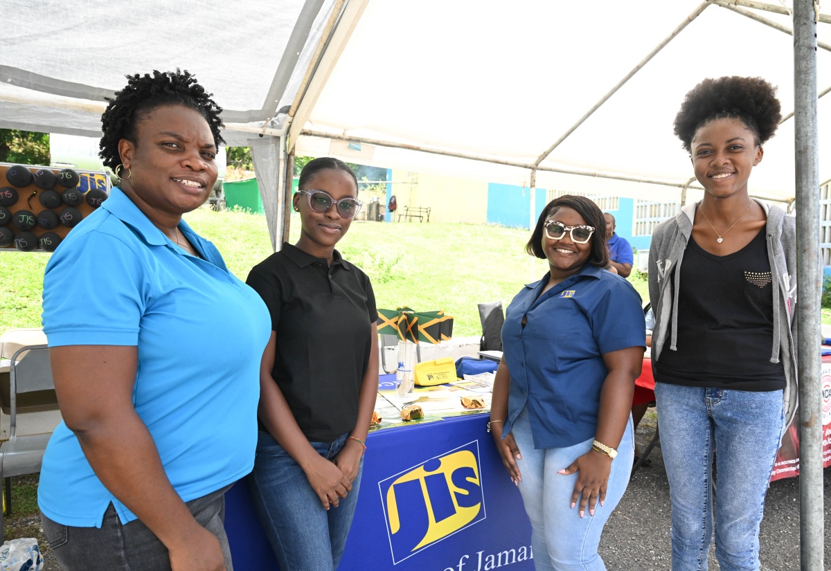 Members of the Jamaica Information Service (JIS) Morant Bay Regional Office team pause for a photograph during the Karing Hearts Foundation’s annual Health Fair and Back-to-School Treat at Font Hill Primary School in St. Thomas on August 14. From left are Manager, Nyoka Linton; Summer Intern, Richana Hewitt; Administrative Assistant, Debrakay McKenzie; and Morant Bay High School student, Davida Quelch.

