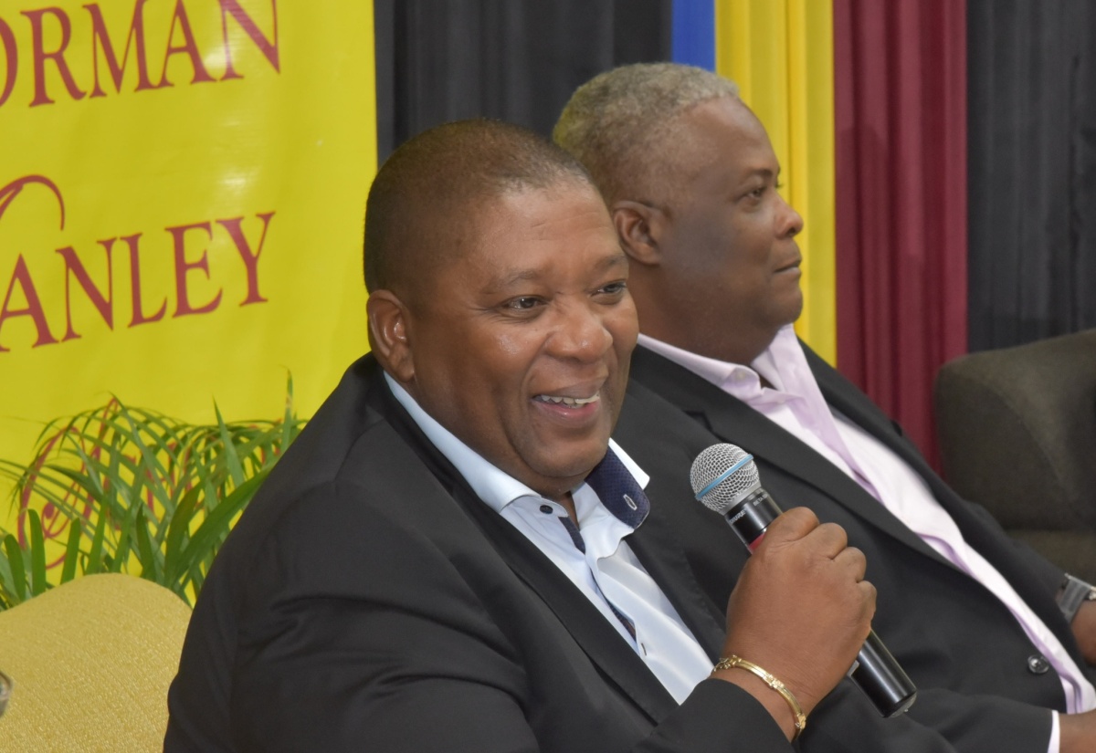 Director General of the International Centre for Environmental and Nuclear Sciences (ICENS) at the University of the West Indies (UWI), Mona, Professor Charles Grant (second left), contributes to a panel discussion after the 'New Freedom Lecture', “No First Use of Nuclear Weapons: The Limits of Law?”, delivered in the Aubrey Fraser Lecture Theatre at the Norman Manley Law School (NMLS) at the University of the West Indies (UWI), Mona, on August 4. At right is Campus Legal Officer at the University of the West Indies (UWI), Mona, Dr. Peter Glegg. 
