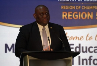 Parliamentary Secretary in the Ministry of Education, Skills, Youth and Information, Senator Marlon Morgan, addresses the Ministry