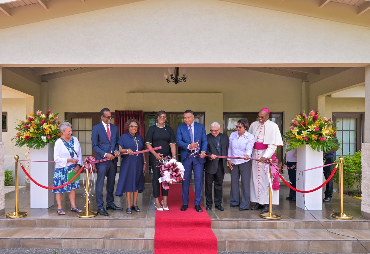 Prime Minister, Dr. the Most Hon. Andrew Holness (fourth right), cuts the ribbon to officially open the Alpha Mercy Historical Centre during a ceremony held on Tuesday (August 18) at the Alpha Campus in Kingston. Also participating are (from left), representing the Institute Leadership Team (ILT) of the Sisters of Mercy of the Americas, Sister Pat Coward; Executive Director of the Tourism Enhancement Fund (TEF), Dr. Carey Wallace; Minister of Culture, Gender, Entertainment and Sport, Hon. Olivia Grange; Speaker of the House of Representatives, the Most Hon. Juliet Holness; Bishop of Mandeville, Most Rev. John Persaud; Chief Executive Officer (CEO) of the Sisters of Mercy of Jamaica, Marcia Tai Chun and Archbishop of Kingston, Most Rev. Kenneth D. Richards. The new centre, which was established partly through a $100-million investment from TEF, serves as a cultural and educational space designed to preserve national history, enrich Jamaica’s heritage and expand cultural tourism opportunities.
