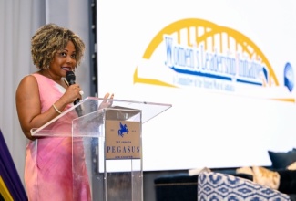Minister of Education, Skills, Youth and Information, Senator Dr. the Hon. Dana Morris Dixon. 
